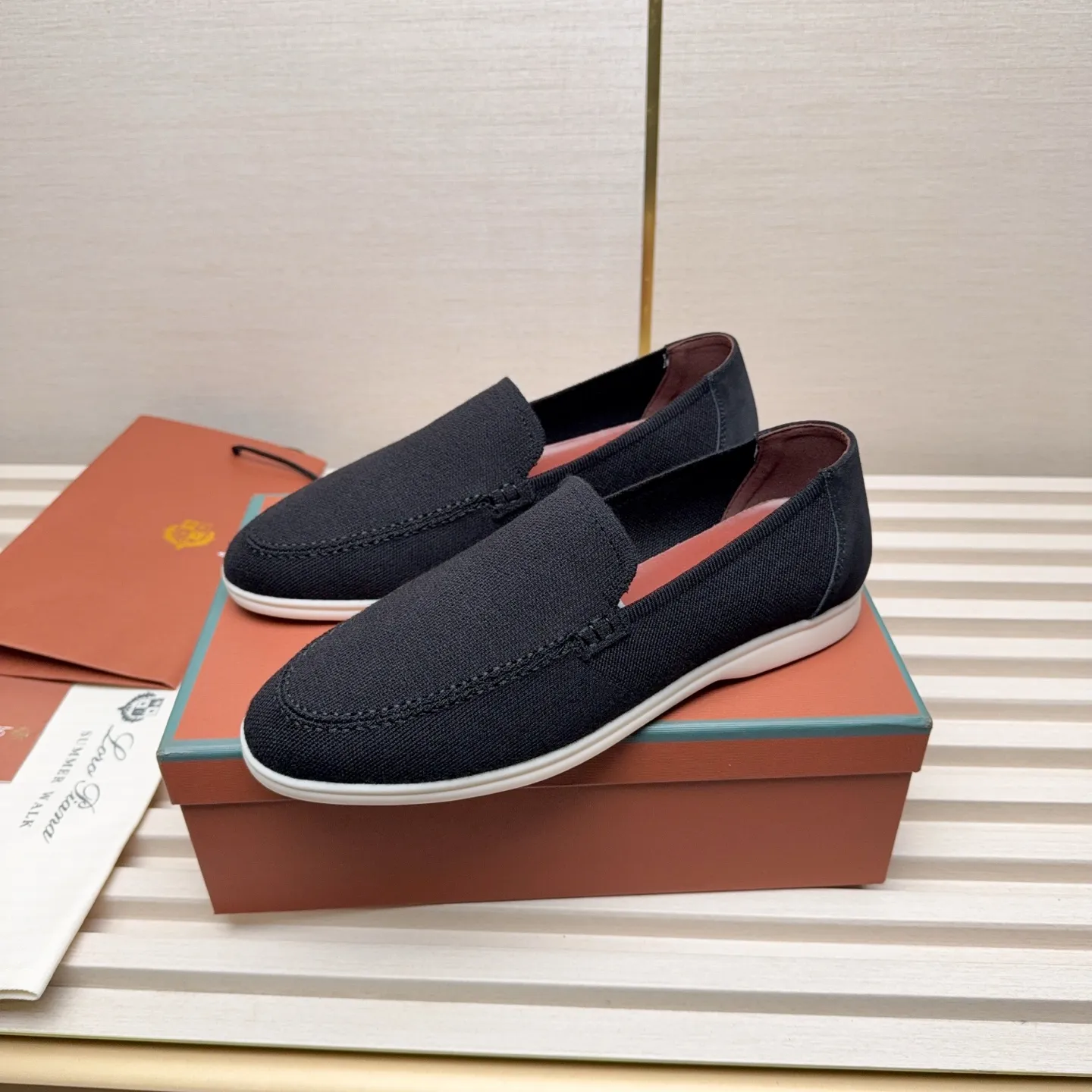 Men's Men's Shoes 💰400 Loro PIana moccasins are made of wish wool fabric. The upper is made of knitted fabric, made on a loom, and then attached to a rubber sole. The Rain System's water-repellent treatment enhances the shoe's functional design, while the suede details give the shoe a sense of elegance and sophistication. Made from Wish, fine wool from Australian and New Zealand Merino sheep